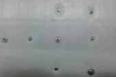 Riveted sample